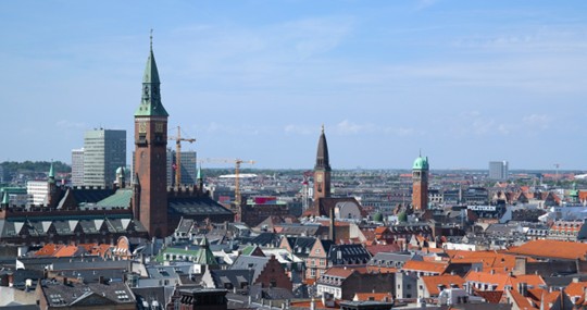 Copenhagen skyline with church steeples and construction cranes
