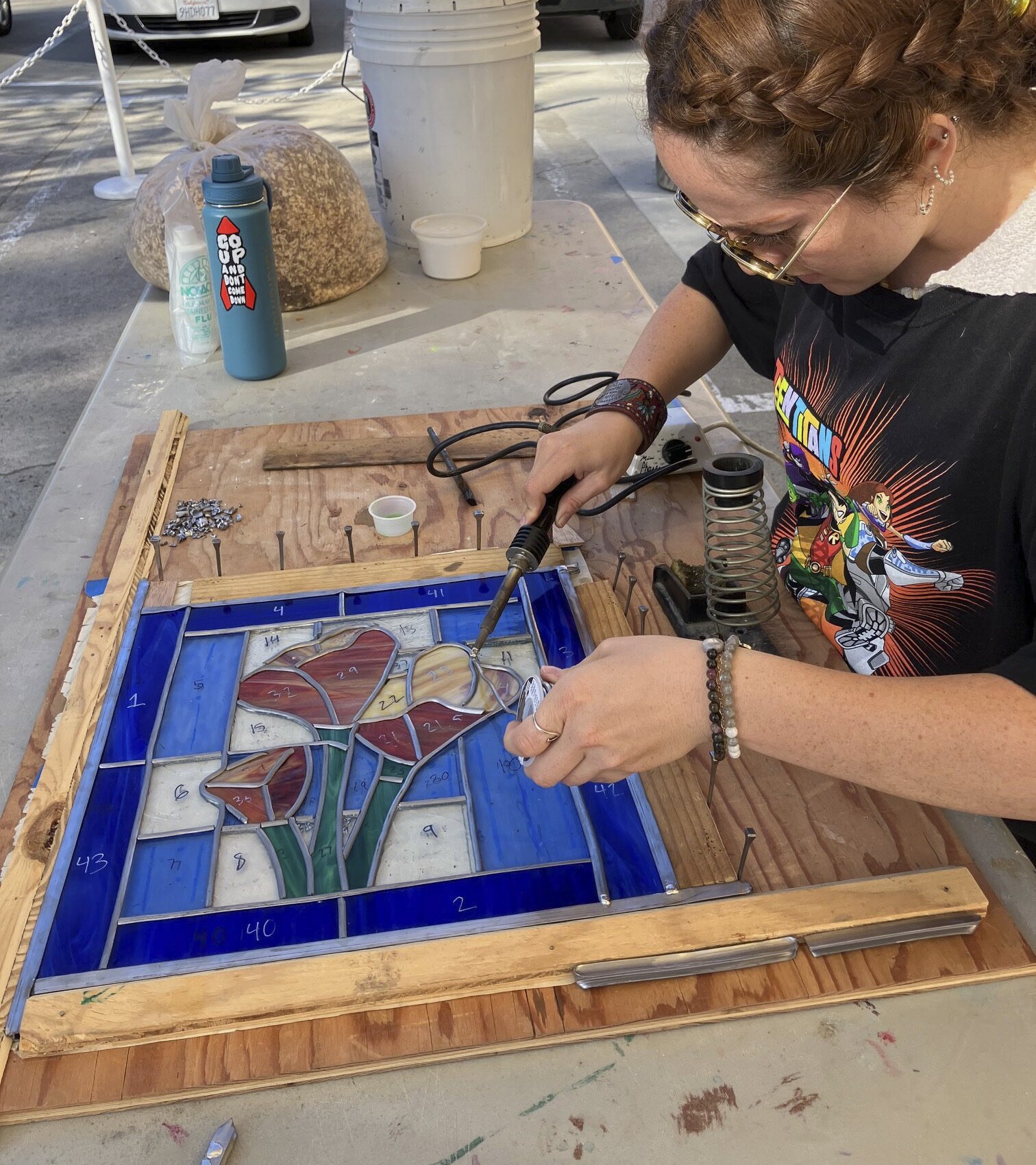 Person making stained glass